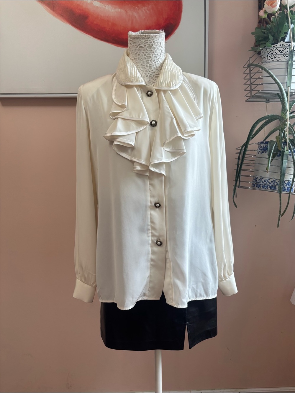 Ruffled Cream Blouse with Decorative Buttons